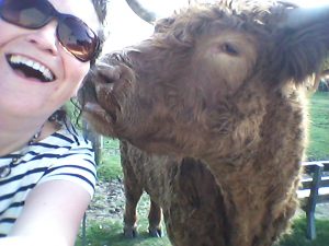 Tour guide Susan Hockey with cow